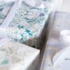 Carmen-Blue-Wrapped-Presents-Blue-Colors_Pearl-and-Maude_square_72 A gift wrapped with Carmen blue floral wrapping paper
