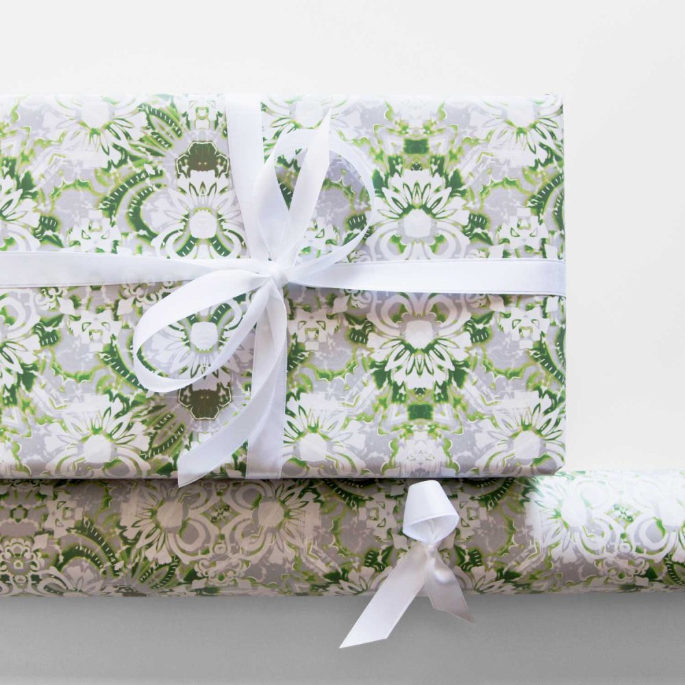 Carmen wrapping paper in green and white foliage pattern