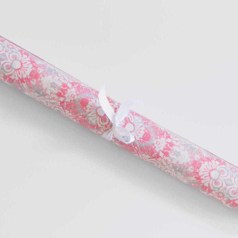 a roll of Carmen pink foliage gift wrapping paper